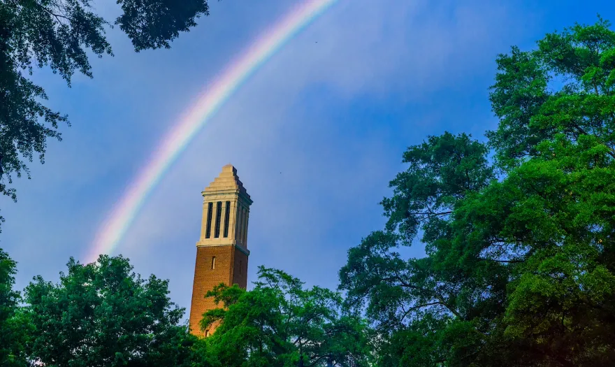 Denny Chimes with a rainbow