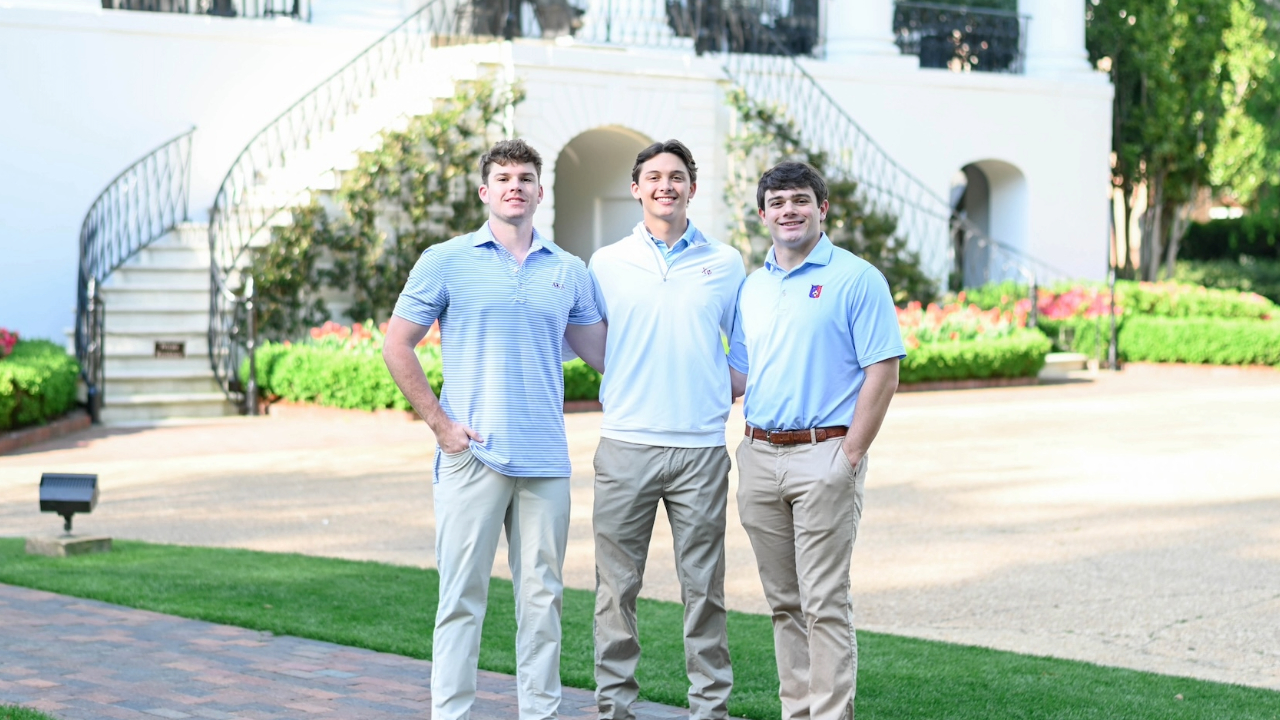 Three Fraternity Members outside of the President's Mansion
